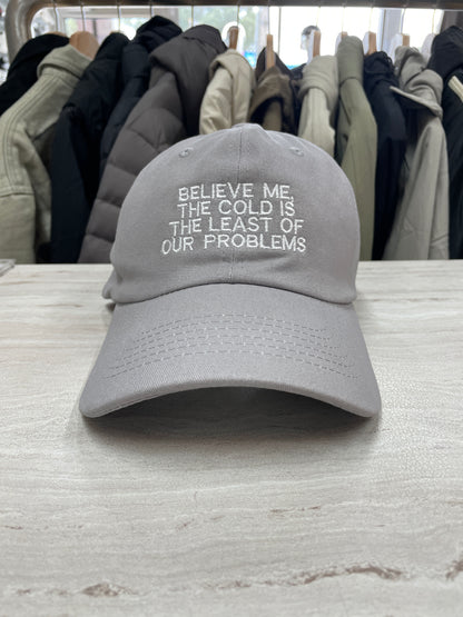 GORRA “BELIEVE ME THE COLD IS THE LEAST OF OUR PROBLEMS”