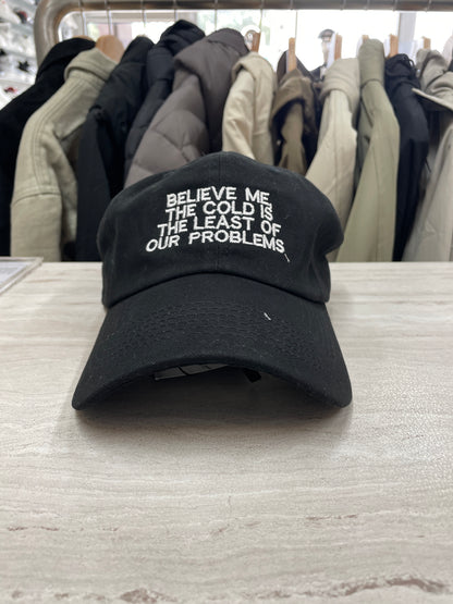 GORRA “BELIEVE ME THE COLD IS THE LEAST OF OUR PROBLEMS”
